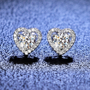 Macro shot of S925 silver heart stud earrings featuring brilliant round moissanite stones