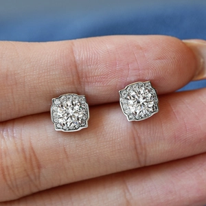 Luxurious S925 silver moissanite stud earrings featuring a square halo and brilliant fire