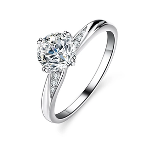 Elegant four-prong silver moissanite ring with round solitaire diamond and side stones
