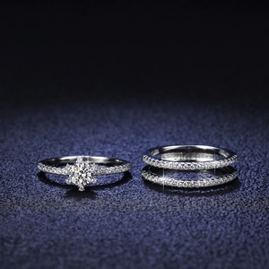 925 silver moissanite ring set with triple row band and round six-prong crown solitaire