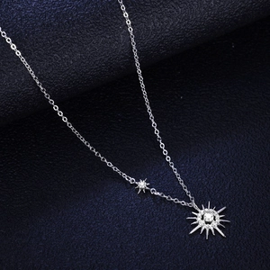 Sparkling 925 sterling silver necklace featuring star pendants and brilliant moissanite stones
