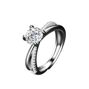 Close-up of a silver six-prong moissanite ring with a double-layered adjustable band
