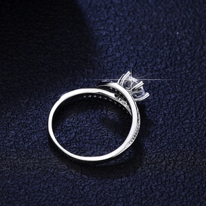 Cross six-prong 925 silver ring with 1ct round moissanite and micro-pave diamonds
