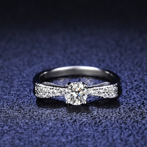 S925 sterling silver bow ring with round brilliant cut moissanite in four-prong setting