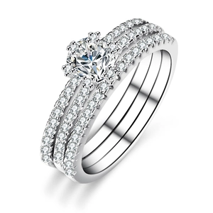 Three-piece Moissanite ring set in 925 sterling silver with sparkling halo and pave bands