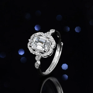 Emerald cut natural blue topaz sterling silver ring with halo moissanite accents