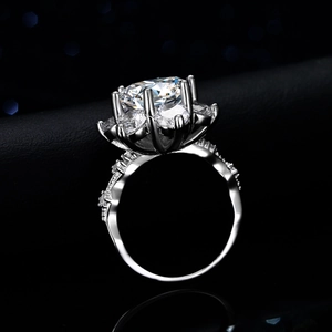 Luxury 5 carat sunflower moissanite ring in 925 sterling silver with starburst halo setting