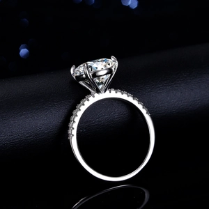 S925 sterling silver four-prong ring with a 5-carat round brilliant cut moissanite stone