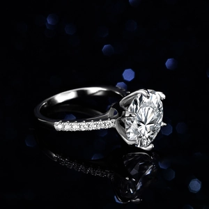 S925 sterling silver ring with 5-carat moissanite in classic six-prong setting on black