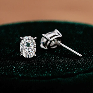 Elegant S925 silver oval-cut moissanite stud earrings with classic four-prong setting
