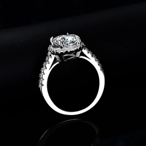 Exquisite S925 sterling silver ring with 2 carat round moissanite and pave accents