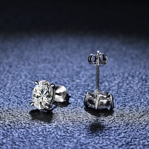 Macro detail of oval cut moissanite stud earrings in four-prong S925 silver setting
