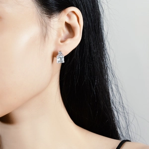 S925 sterling silver drop earrings with emerald cut clear cubic zirconia on model
