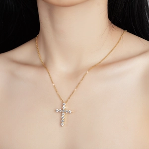 925 silver moissanite cross necklace with gold finish on model for stylish look