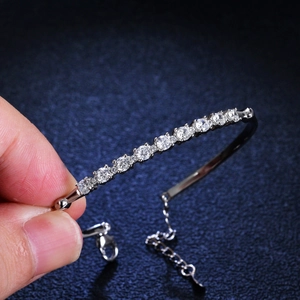 925 silver moissanite bracelet with row of sparkling round stones and lobster clasp