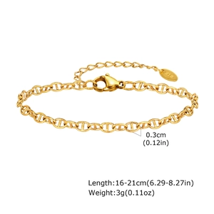 Détail du bracelet en or 18K avec fermoir mousqueton et étiquette K18 réglable