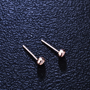 Minimalist S925 silver rose gold stud earrings with round moissanite on black leather