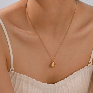 Elegant 18K gold-plated stainless steel necklace with oval clover pendant on model