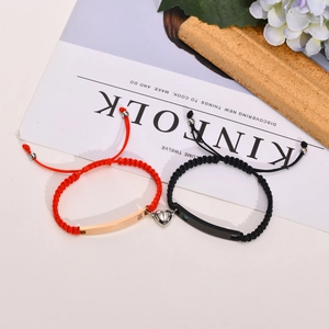 Bracelets magnétiques pour couples avec corde en nylon rouge et noir et pendentif cœur