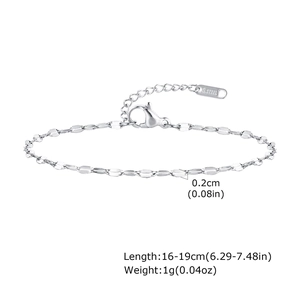 Macro detail of 0.2cm stainless steel bracelet with lobster clasp and extension chain