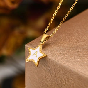 Golden titanium steel star pendant necklace with white enamel and letter A detail