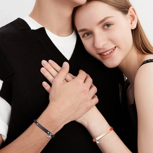 Bracelets magnétiques pour couple avec corde en nylon tressée et breloques cœur en acier