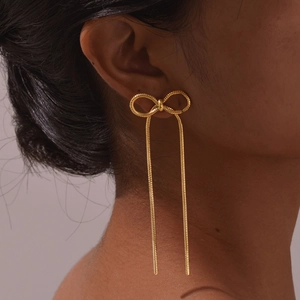 Boucles d'oreilles nœud en acier inoxydable doré avec longues franges en chaîne