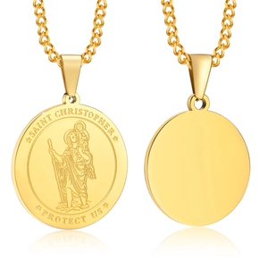 Detail of gold Saint Christopher medal necklace with relief and polished back