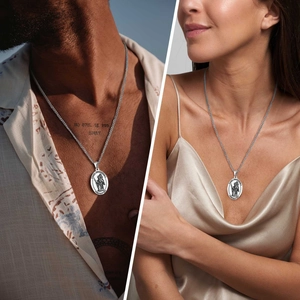 Detailed view of Saint Christopher oval medal on a cross chain for men and women