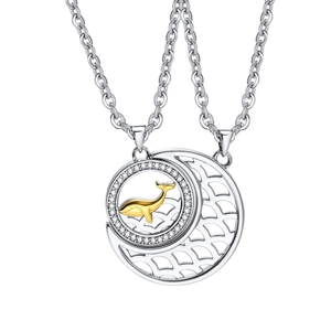 Matching couple whale pendants in copper with cubic zirconia and puzzle sun moon design