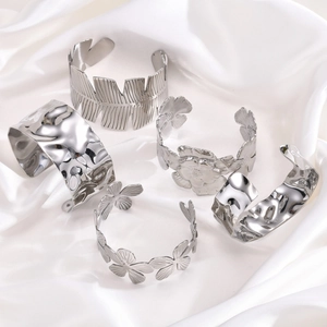 Bracciali rigidi aperti in acciaio inossidabile argento con motivi piuma e fiori