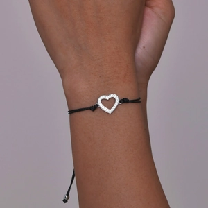 Adjustable black braided heart bracelet set with sparkling cubic zirconia in stainless steel