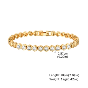 Close-up of gold-tone tennis bracelet with 18cm length and zircon width dimensions