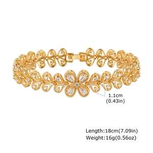 Detail showing gold floral bracelet dimensions 18cm length with zircon heart links
