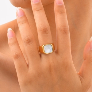 Golden stainless steel geometric signet ring for women featuring a white shell inlay