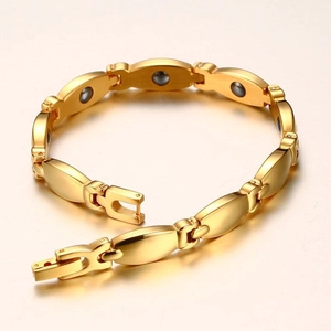 Golden magnetic therapy stainless steel bracelet with oval links and fold-over clasp
