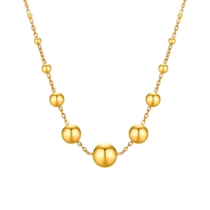 Collier chic en acier inoxydable doré avec neuf perles métalliques de taille dégradée