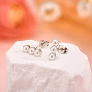 Elegant white triple pearl drop earrings with silver platinum plating for women