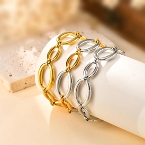 Lot de trois bracelets à grosses mailles en or et argent, bijoux minimalistes en acier
