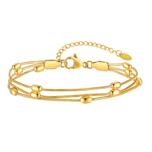 Three-layer gold snake chain bracelet with golden beads and K18 hallmark on white backdrop