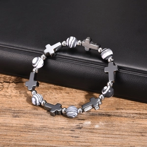 Mens cross bracelet with marble texture beads and silver spacers on leather and wood