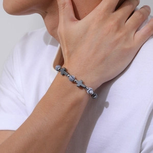 Men's minimalist beaded bracelet featuring black stone beads and silver cross charms