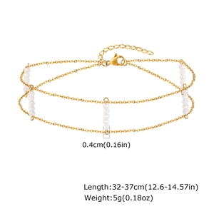 Detail of double-layer gold chain with white faceted beads and product specifications