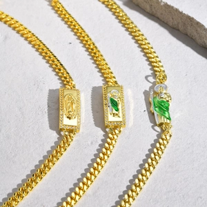 Golden Cuban link bracelet with Virgin Mary pendant and green enamel Saint Jude charm