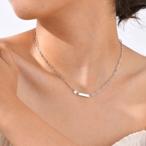Women silver paperclip chain necklace with a round zircon and a polished metal bar