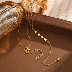 Elegante collana a Y in acciaio inossidabile dorato con ciondoli a disco lucidi