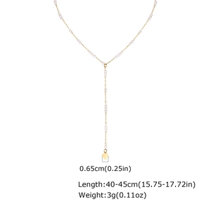 Detail view of gold Y-shaped necklace with small pearls and heart charm measurements