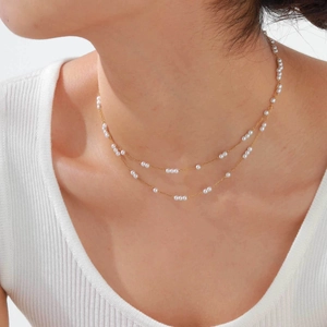 Collier double rang doré en acier inoxydable pour femme avec perles blanches élégantes
