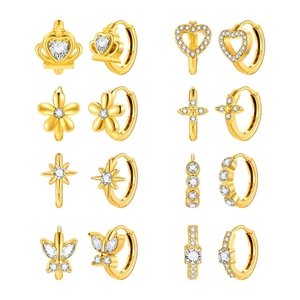 Set of 8 gold hoop earrings with zircon heart, star, and flower charms in a grid layout