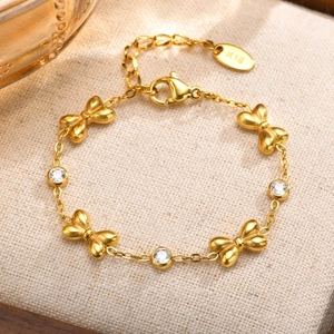 Elegant gold butterfly bracelet with zircon stones and K18 engraving for girls